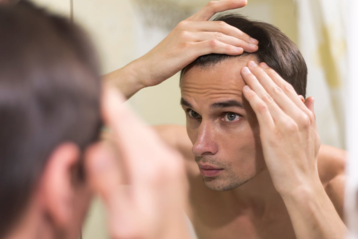 close-up-man-grooming-hair